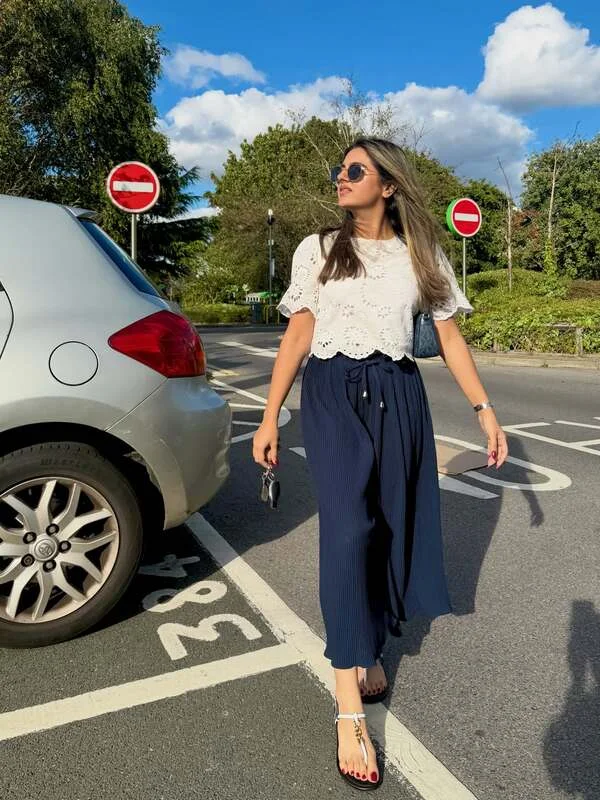 White Eyelet Top And Navy Skirt