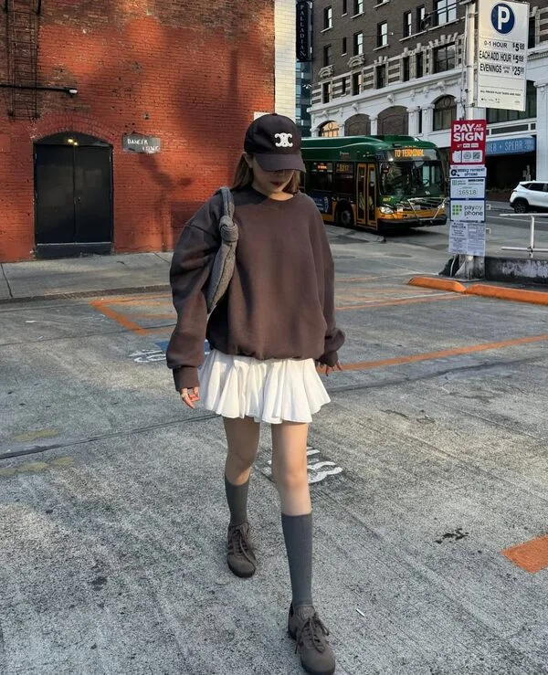 Oversized Sweatshirt And Pleated Mini Skirt