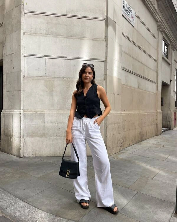 Black Vest Top and White Trousers