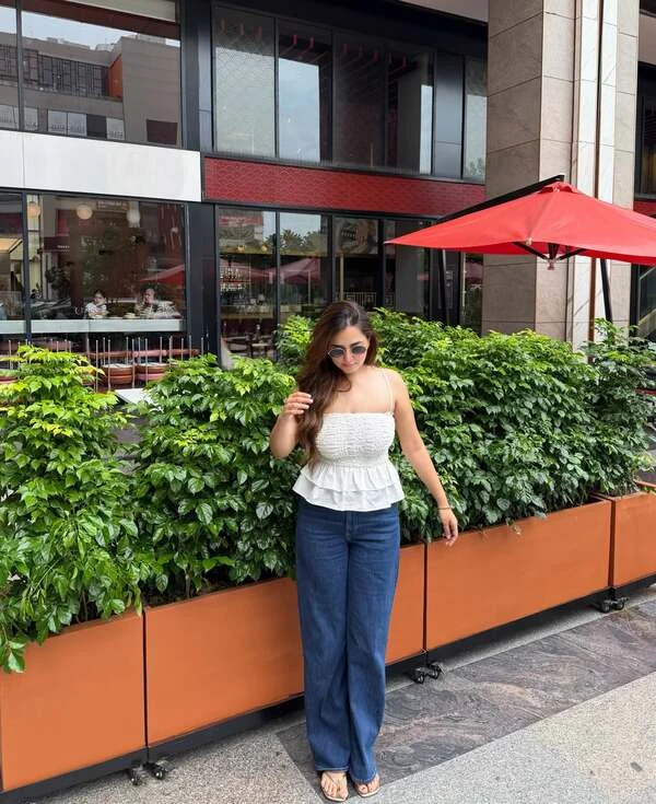White Peplum Top and Wide-Leg Jeans