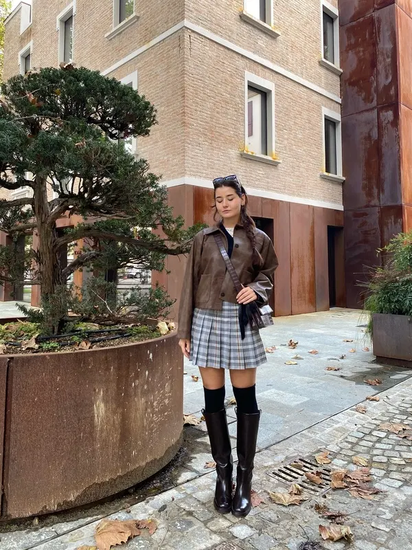 Leather Jacket and Plaid Skirt